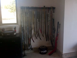 Hockey sticks are now put away with the Rink Rack!
